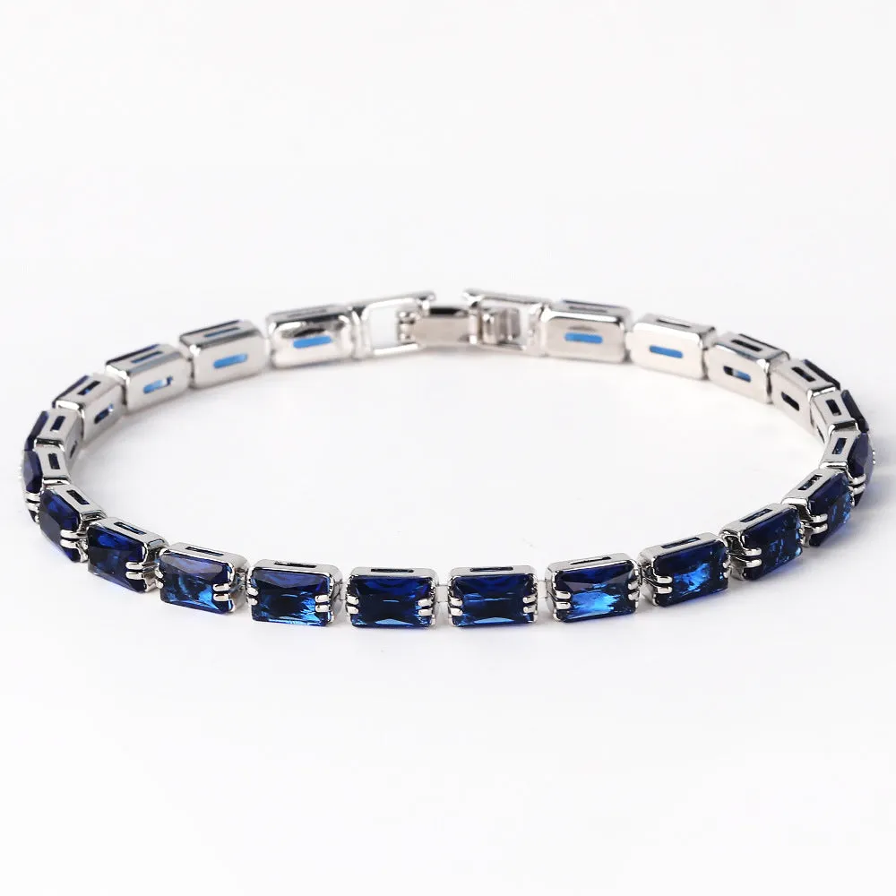 Electroplated zircon bracelet for women with gold tone finish and blue zircon stones