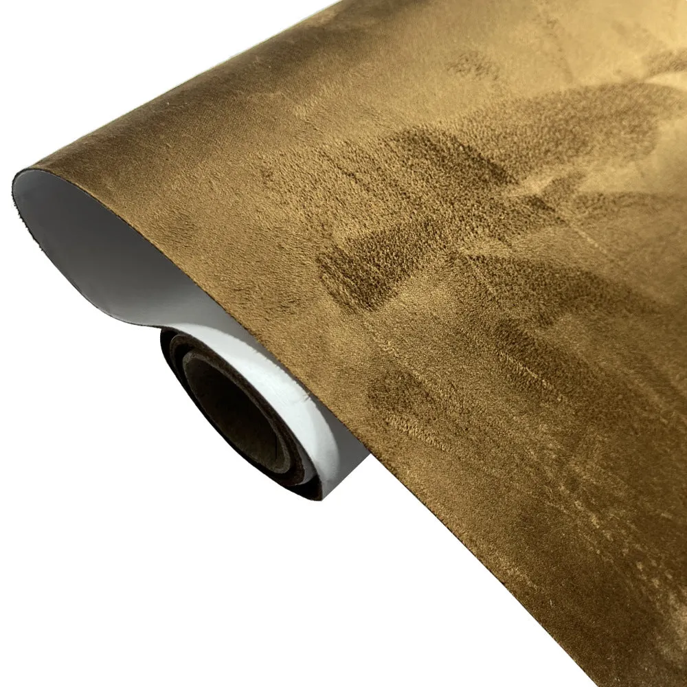 Self-adhesive leather suede sheet in beige colour showing texture and adhesive backing.