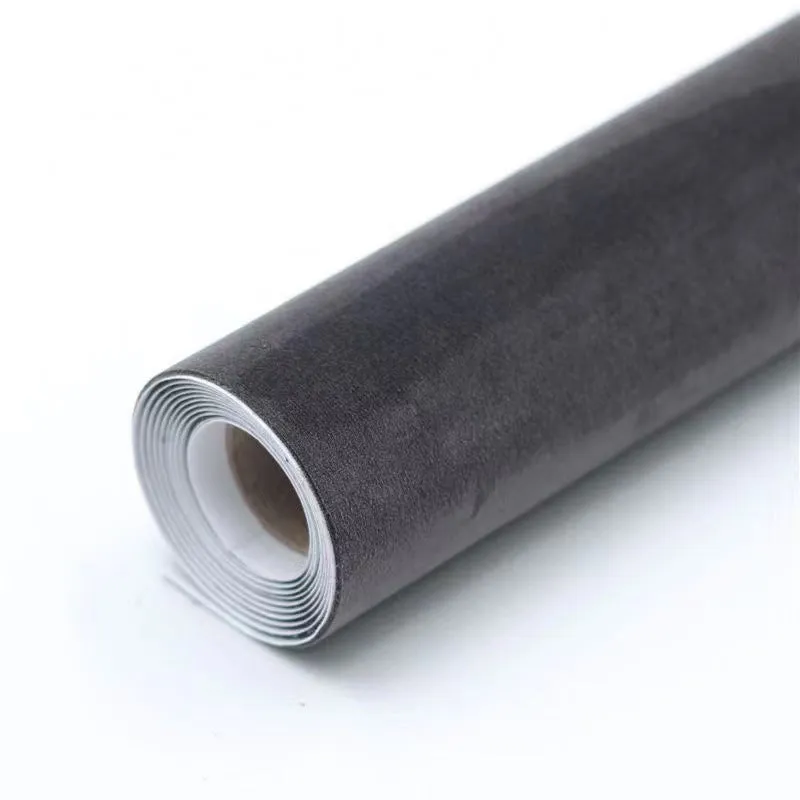 Self-adhesive leather suede sheet in beige colour showing texture and adhesive backing.
