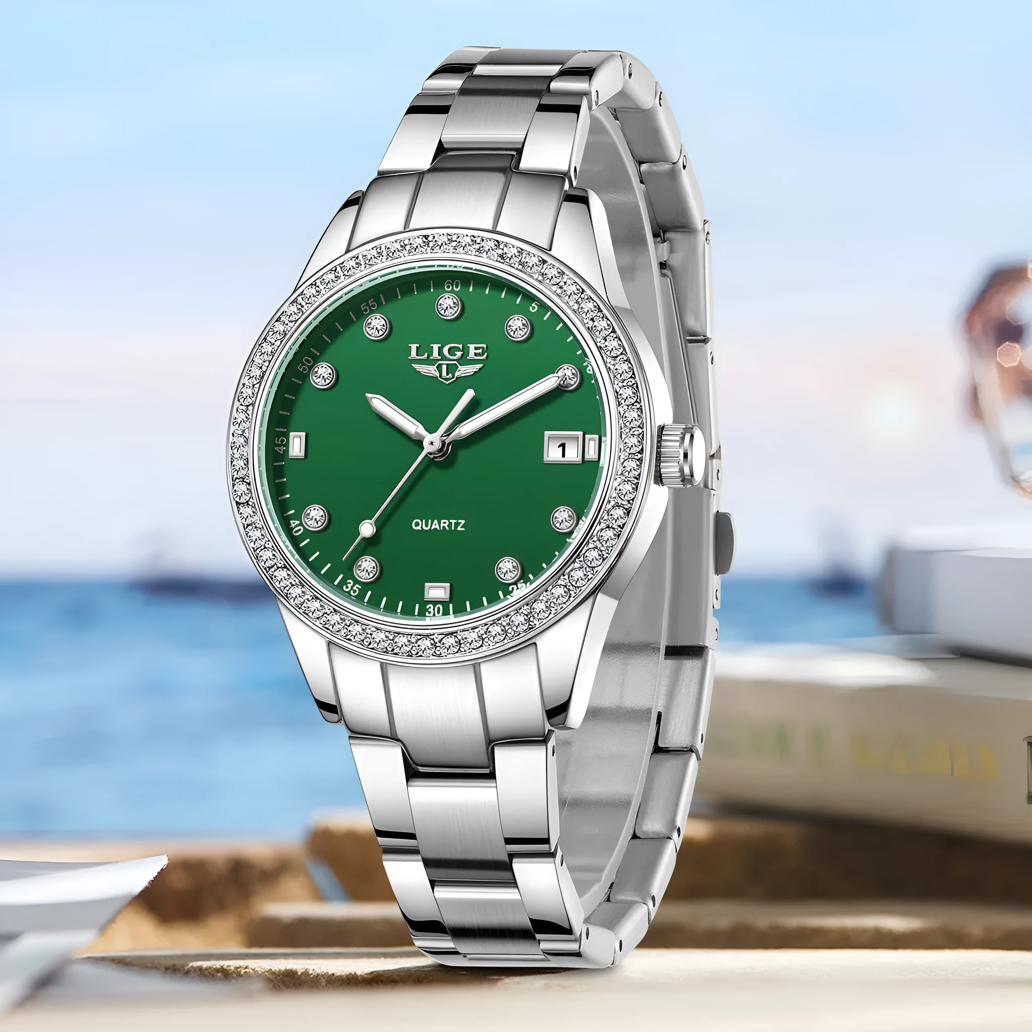 Silver fashion quartz watch with diamond markers on a 34mm stainless steel case and luminous hands.
