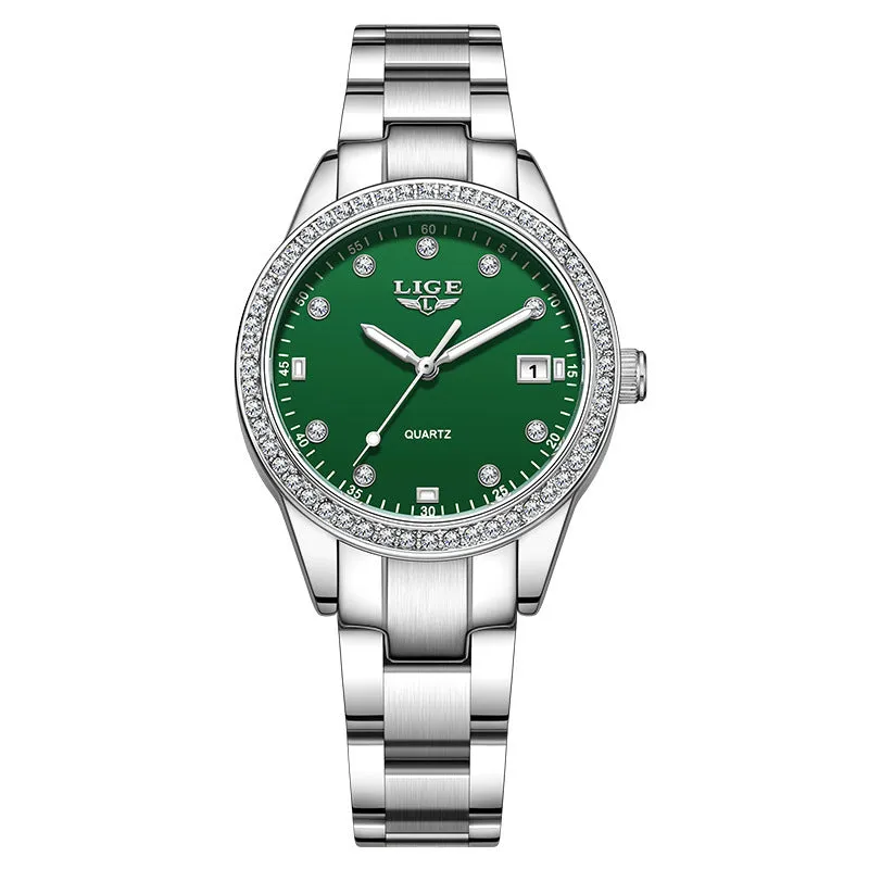 Silver fashion quartz watch with diamond markers on a 34mm stainless steel case and luminous hands.