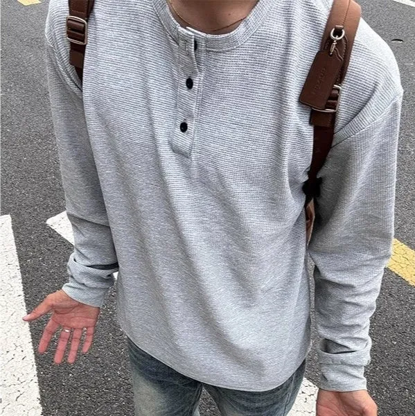 Black American Henry collar long-sleeved men's pullover top, loose fit, solid colour, polyester blend fabric