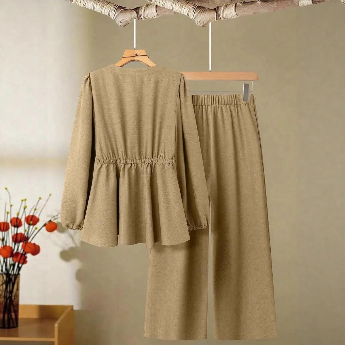 Women's woven polyester two-piece suit in wine red with button-front long-sleeved top and matching full-length trousers