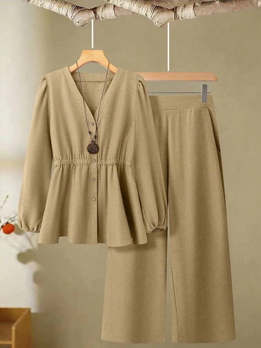 Women's woven polyester two-piece suit in wine red with button-front long-sleeved top and matching full-length trousers