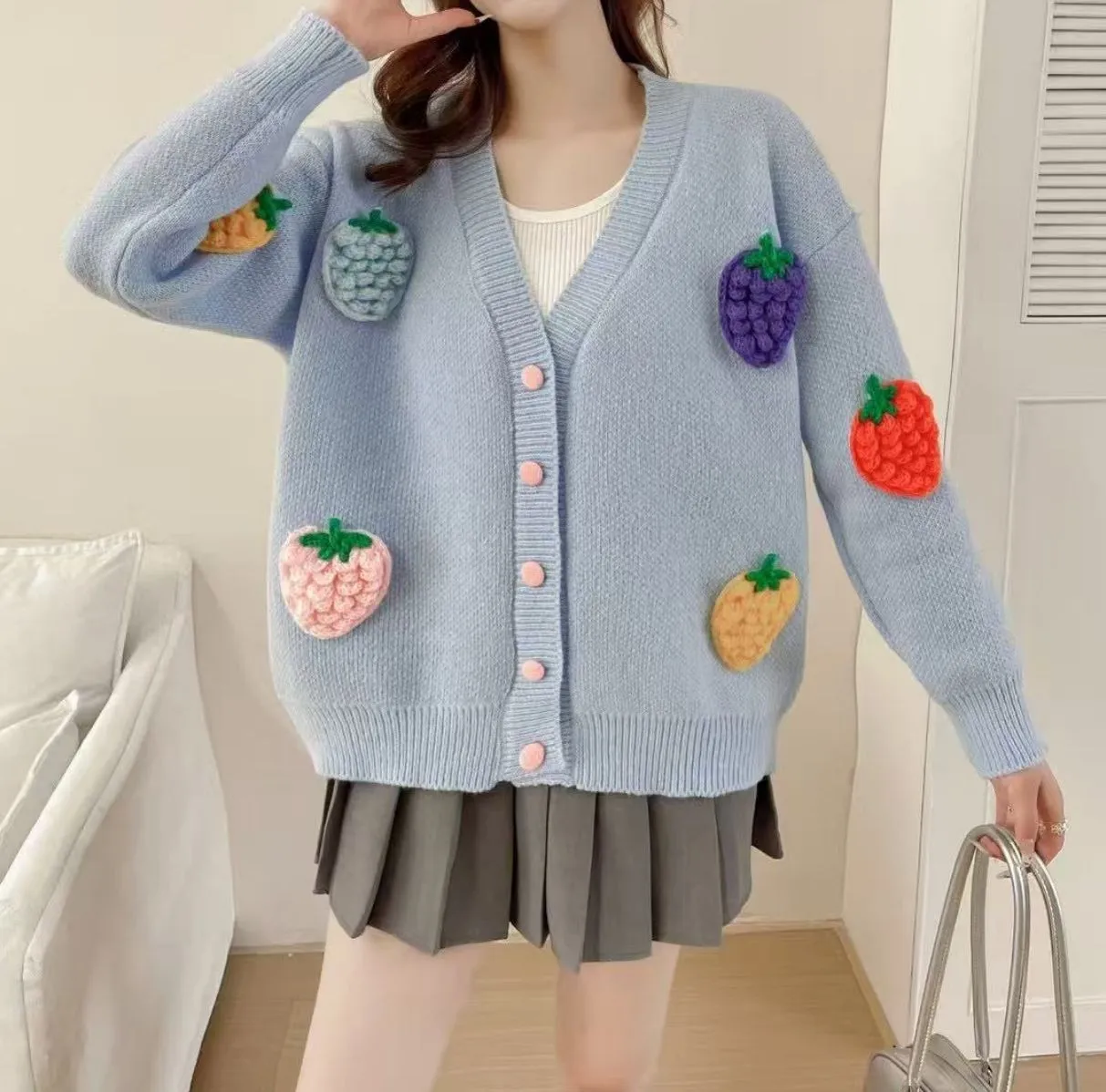 Handmade embroidery thick knit cardigan in light blue with loose fit and long sleeves