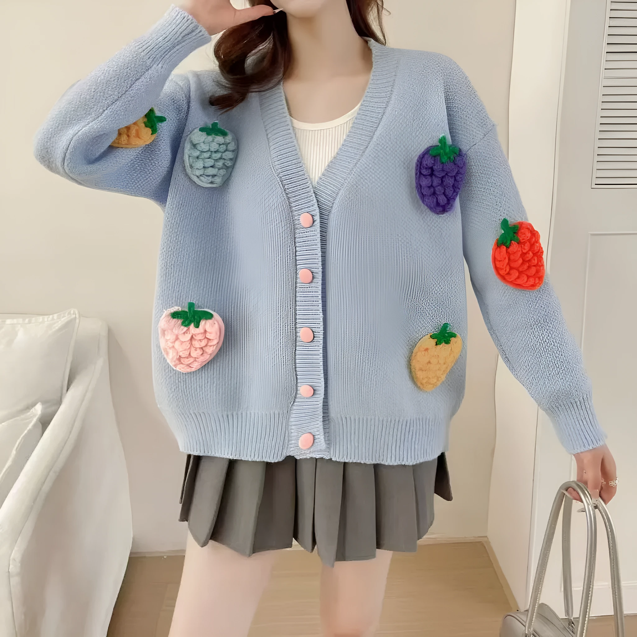 Handmade embroidery thick knit cardigan in light blue with loose fit and long sleeves