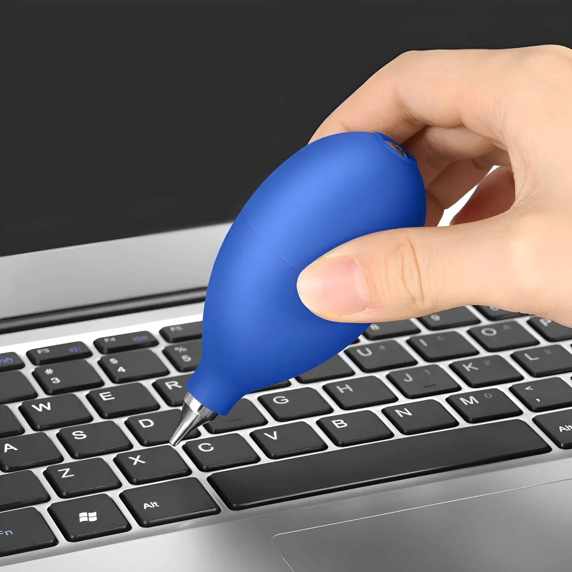Blue rubber manual air blower dust removal tool for cleaning camera lenses and mobile phones.