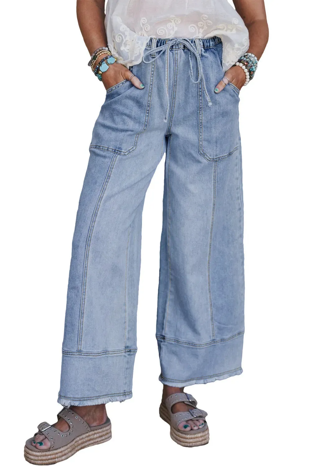 Beau Blue wide leg denim trousers with drawstring waist and raw unfinished hem detail