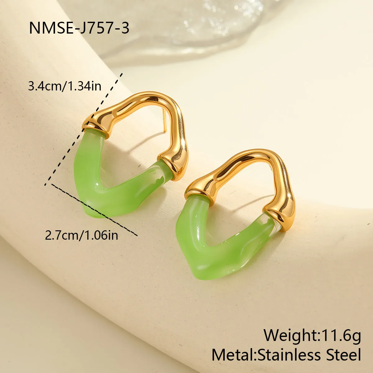 Stainless steel earrings with pink resin stitching and 18K gold plating