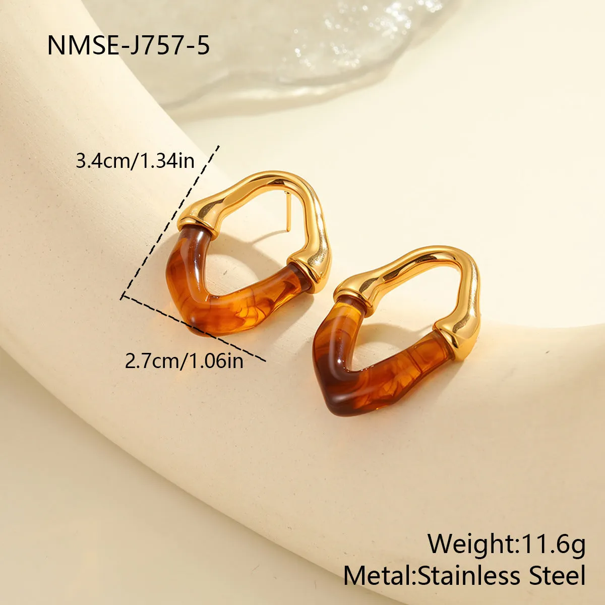 Stainless steel earrings with pink resin stitching and 18K gold plating