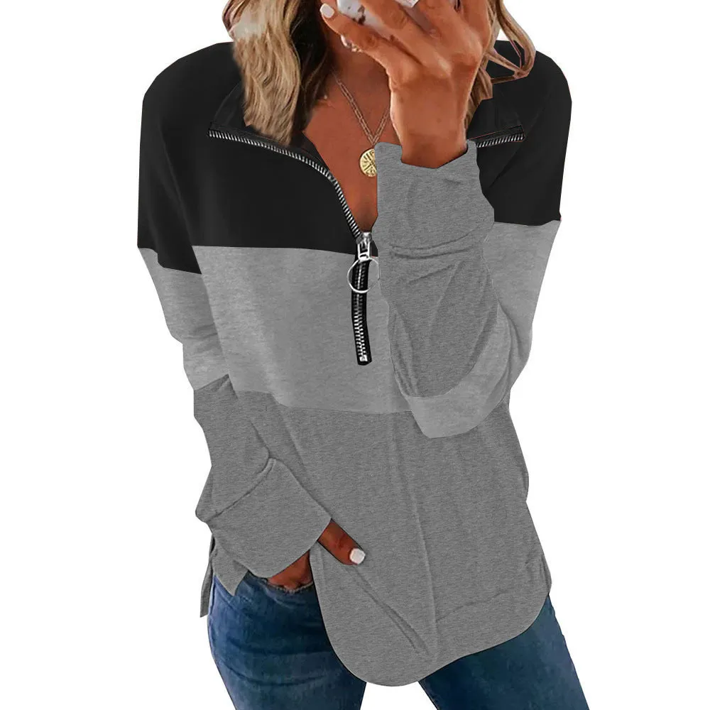 Women's loose-fitting long-sleeved leopard print sweater in various colours on a hanger.