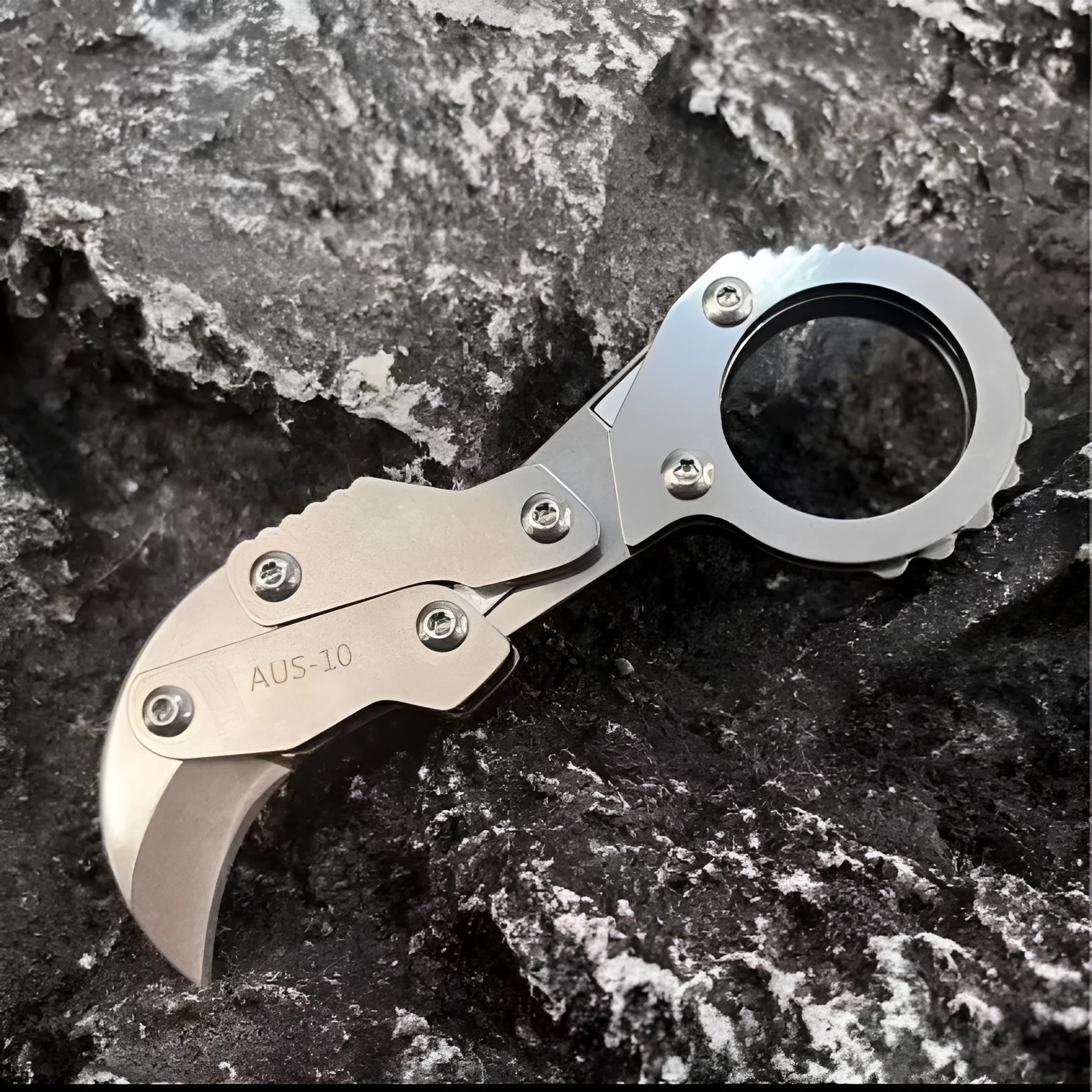 Compact 12mm folding knife with stainless steel 420J2 blade and folding mechanism