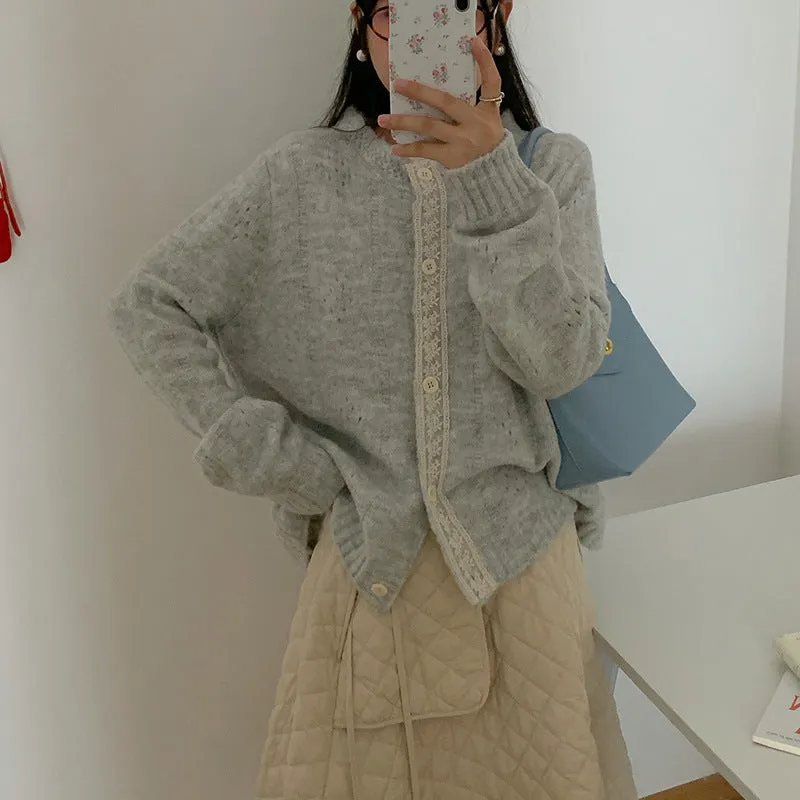 Art retro style Korean knit sweater coat cardigan in a loose free size, shown in apricot colour.