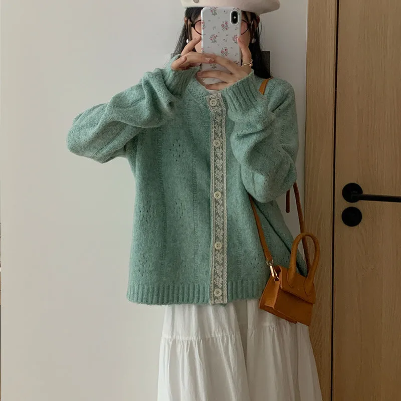Art retro style Korean knit sweater coat cardigan in a loose free size, shown in apricot colour.
