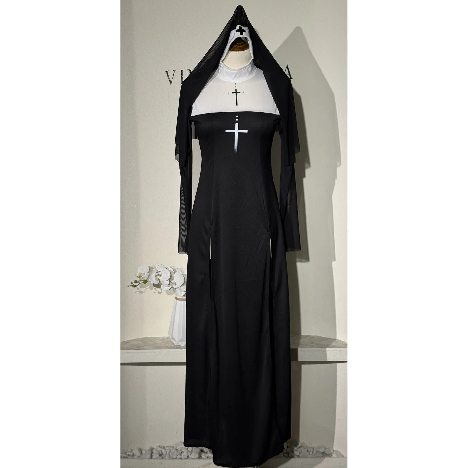Black polyester women's nun costume dress with long sleeves for Halloween or cosplay