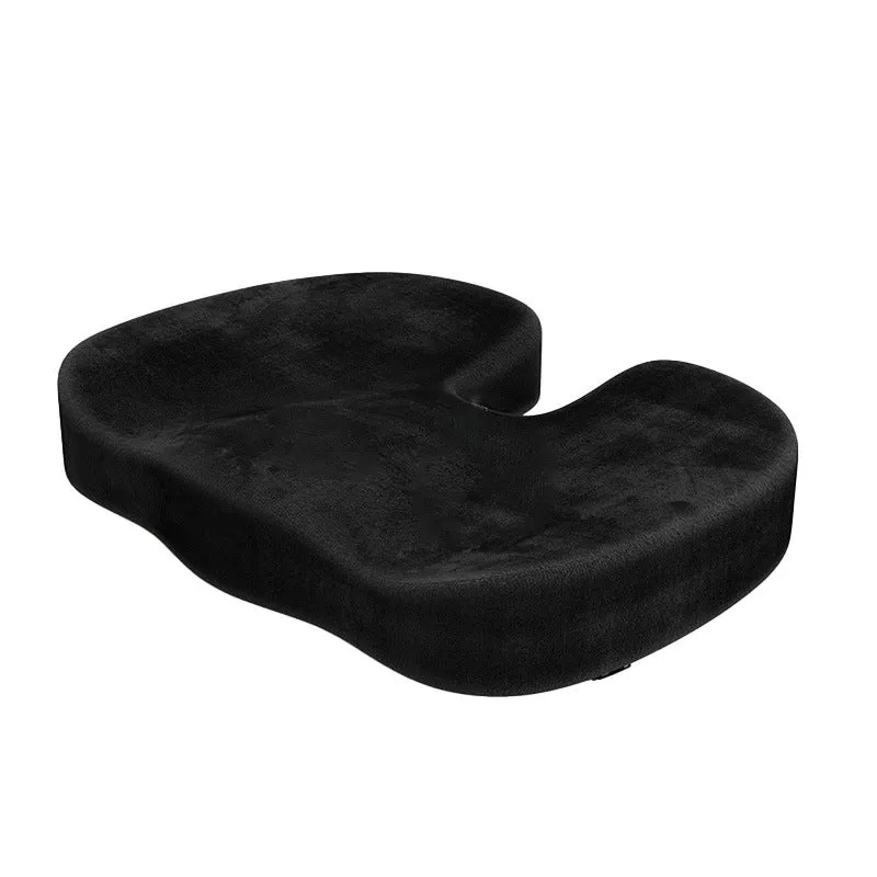 Black U-shaped memory foam seat cushion for office chairs, shown on a wooden seat.