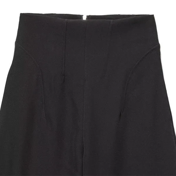 Women's black nylon high-waist zip-front straight-leg trousers on model
