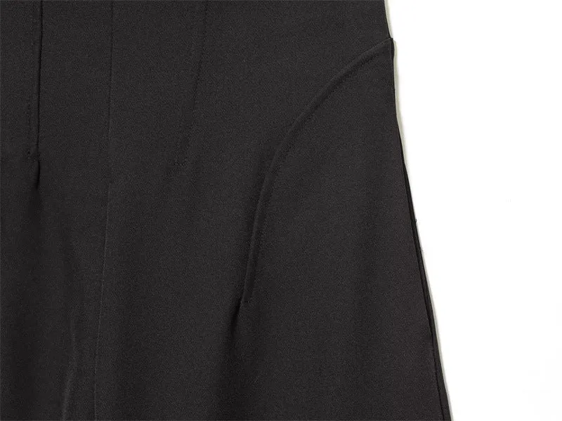 Women's black nylon high-waist zip-front straight-leg trousers on model