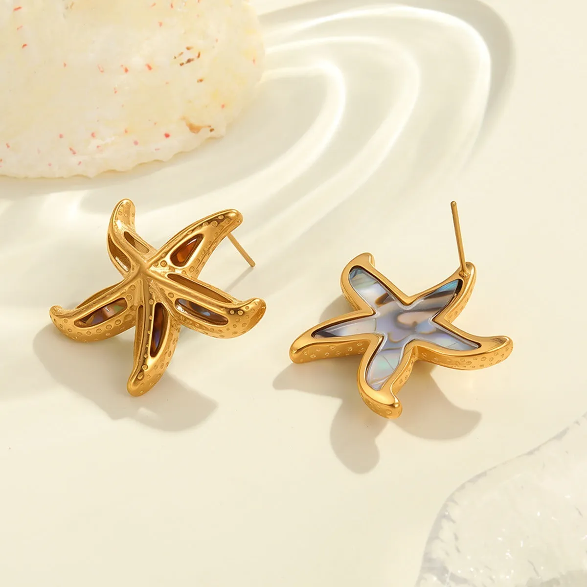 Gold-toned stainless steel stud earrings with starfish and star motifs, colour NMSE-J725-3
