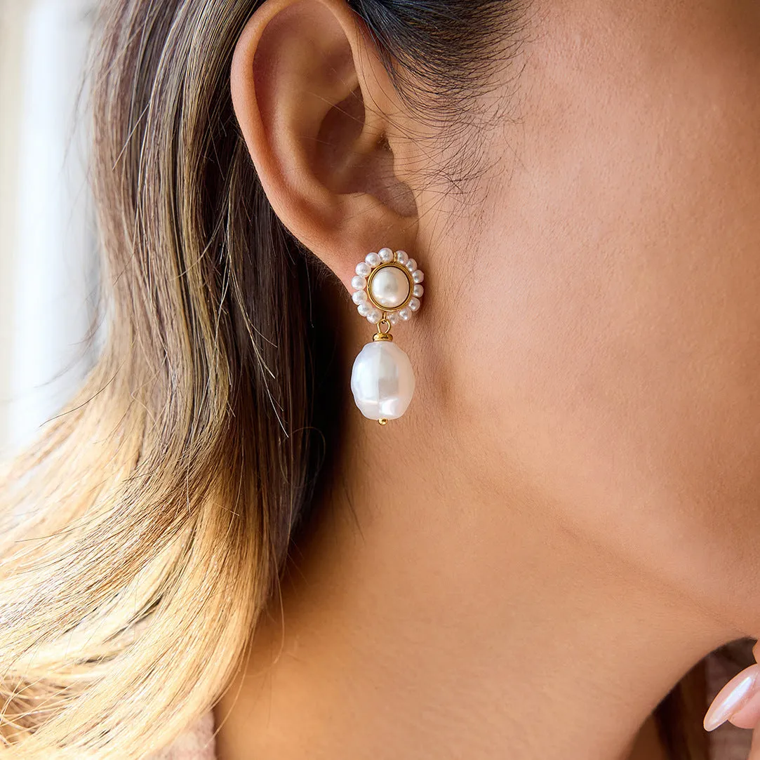 Women's stainless steel light pearl ear studs, geometric shape, electroplated finish, one pair.
