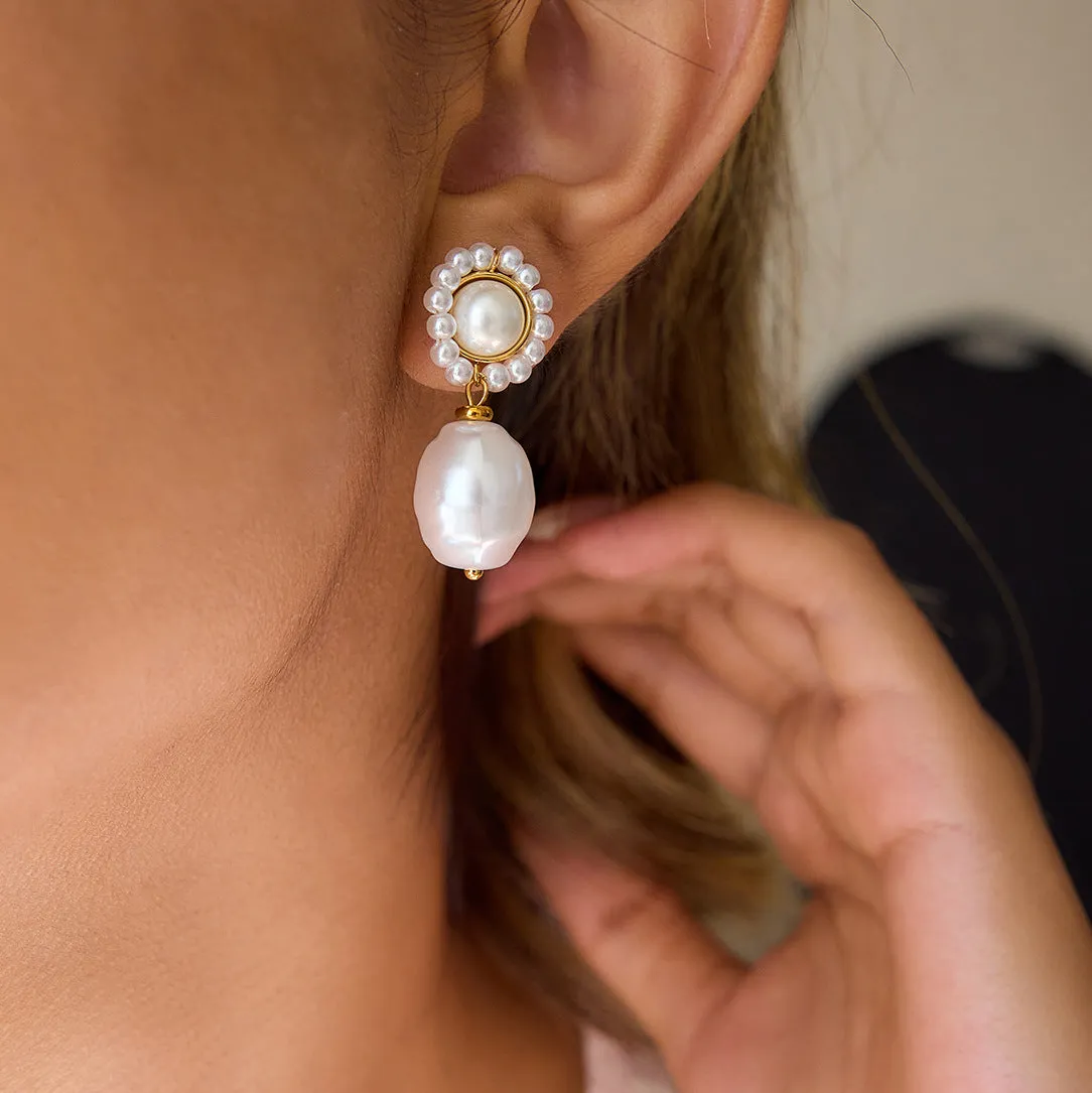 Women's stainless steel light pearl ear studs, geometric shape, electroplated finish, one pair.