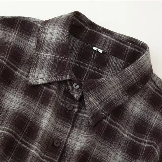 Women's loose-fit plaid shirt with long sleeves, button placket, and plant-and-flower print on a blue-green plaid base