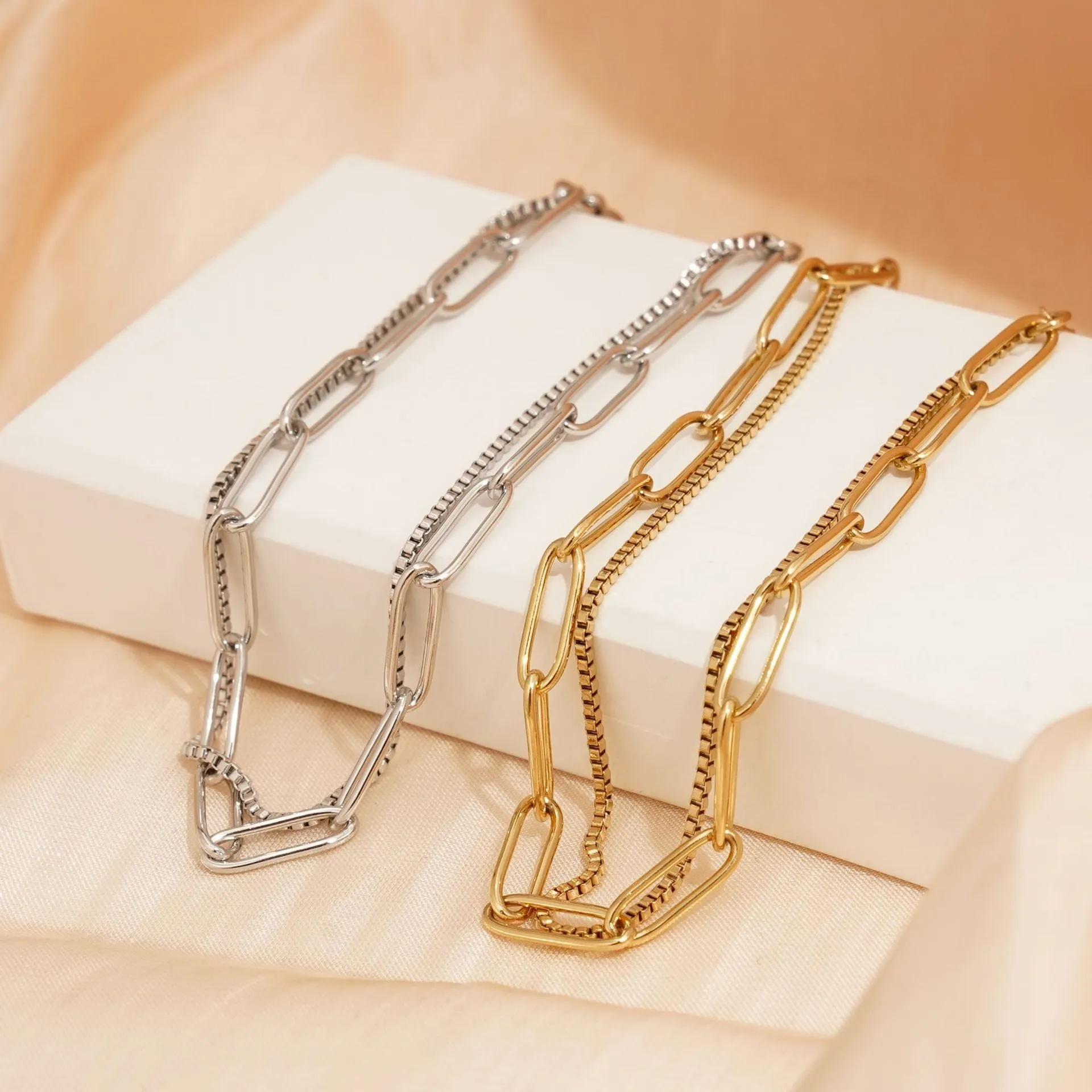 Women's double layer titanium steel bracelet with geometric lines in gold or silver electroplate