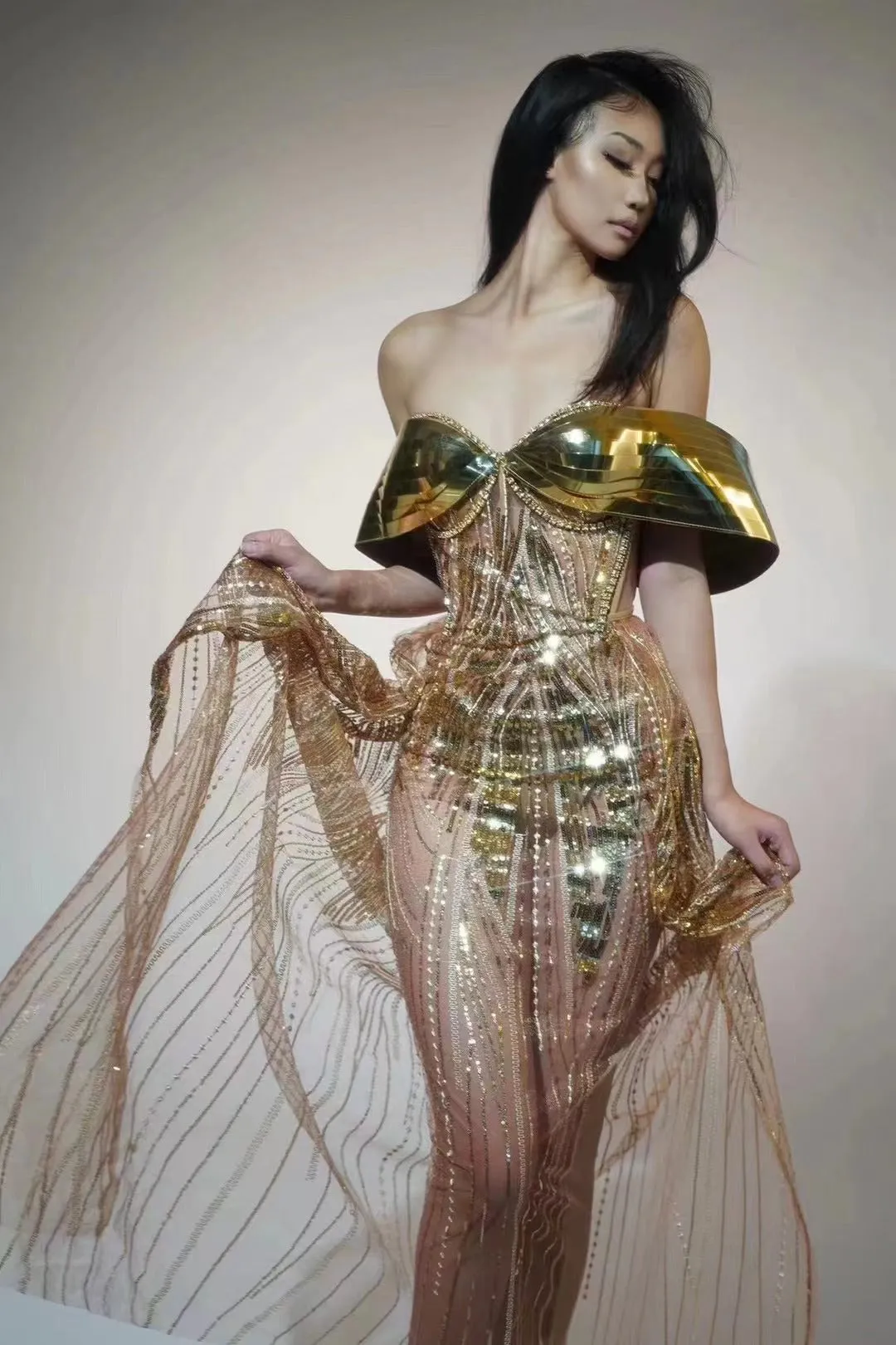 Gold strapless sequined women's formal dress with side split in long skirt