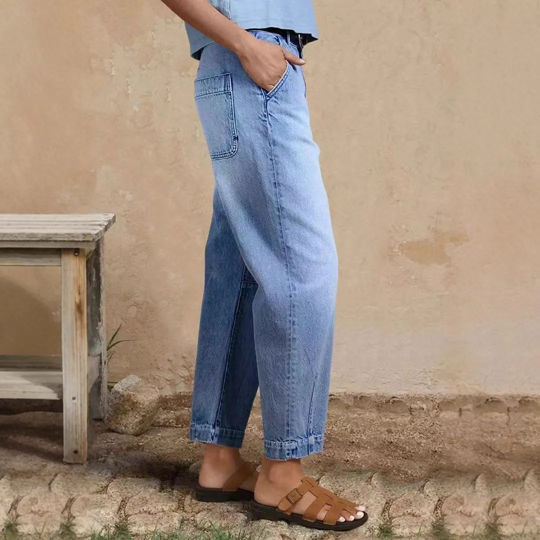Casual loose jeans trousers in light blue denim with washed finish