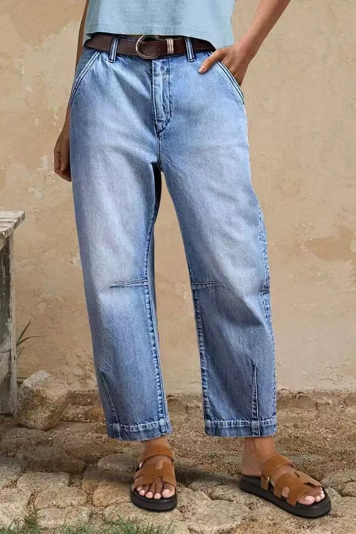 Casual loose jeans trousers in light blue denim with washed finish