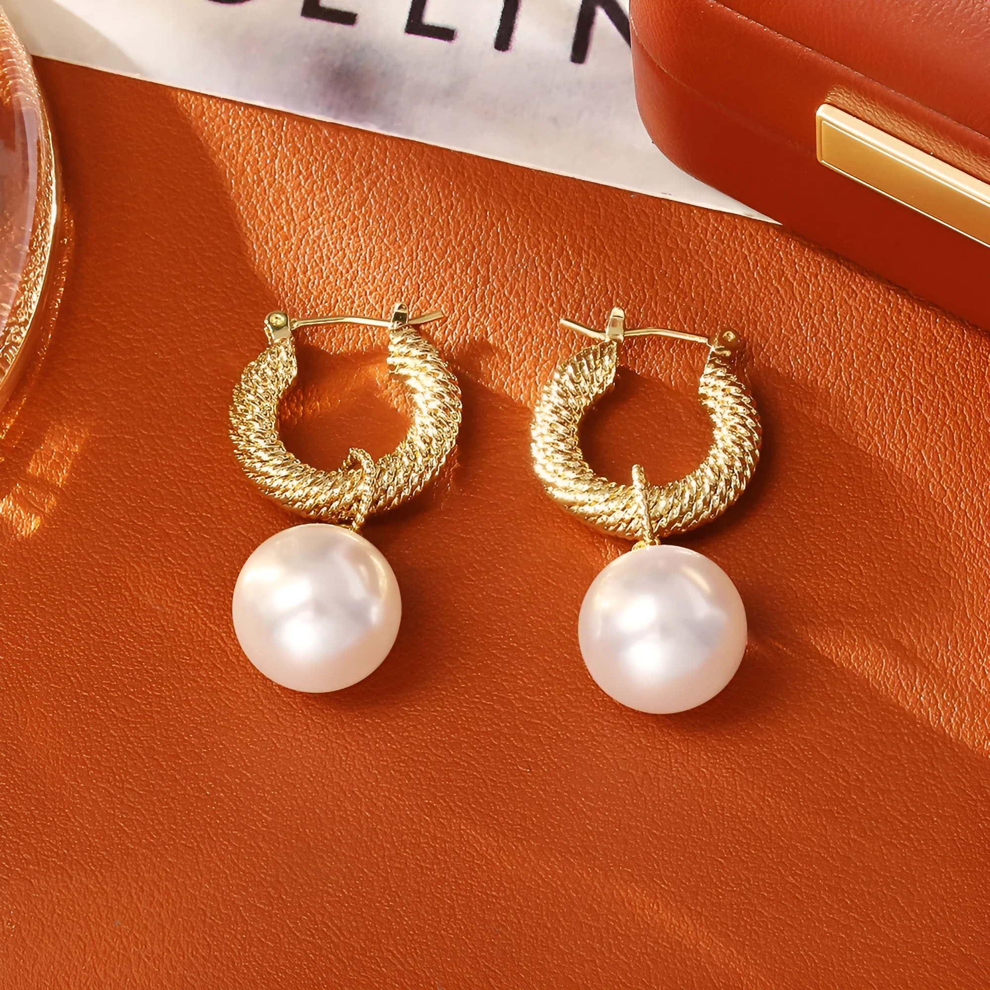 Geometric round copper earrings with real gold plating in white colour for women