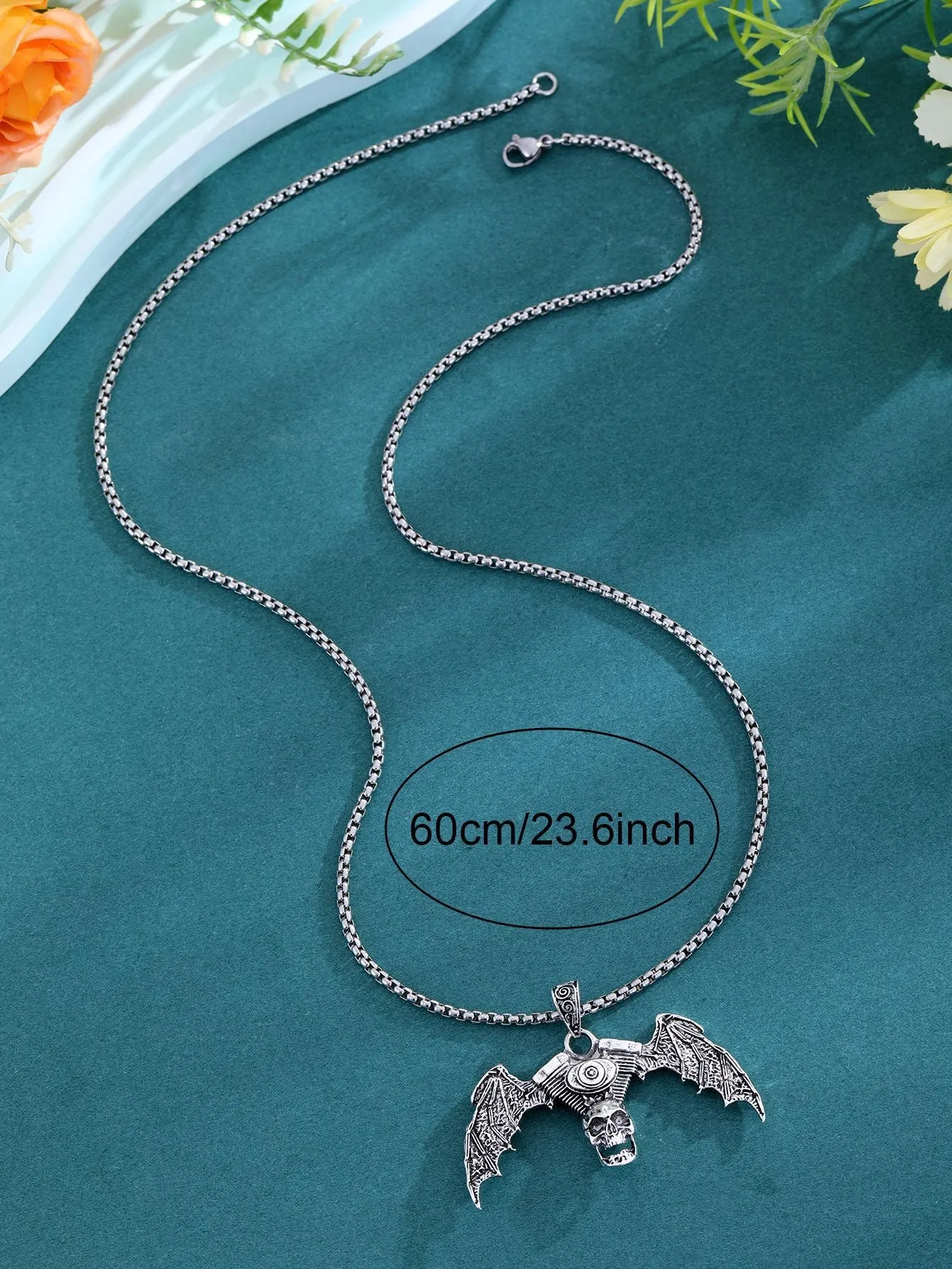 Gothic dark skull necklace with aluminium alloy skeleton wing pendant on dark background