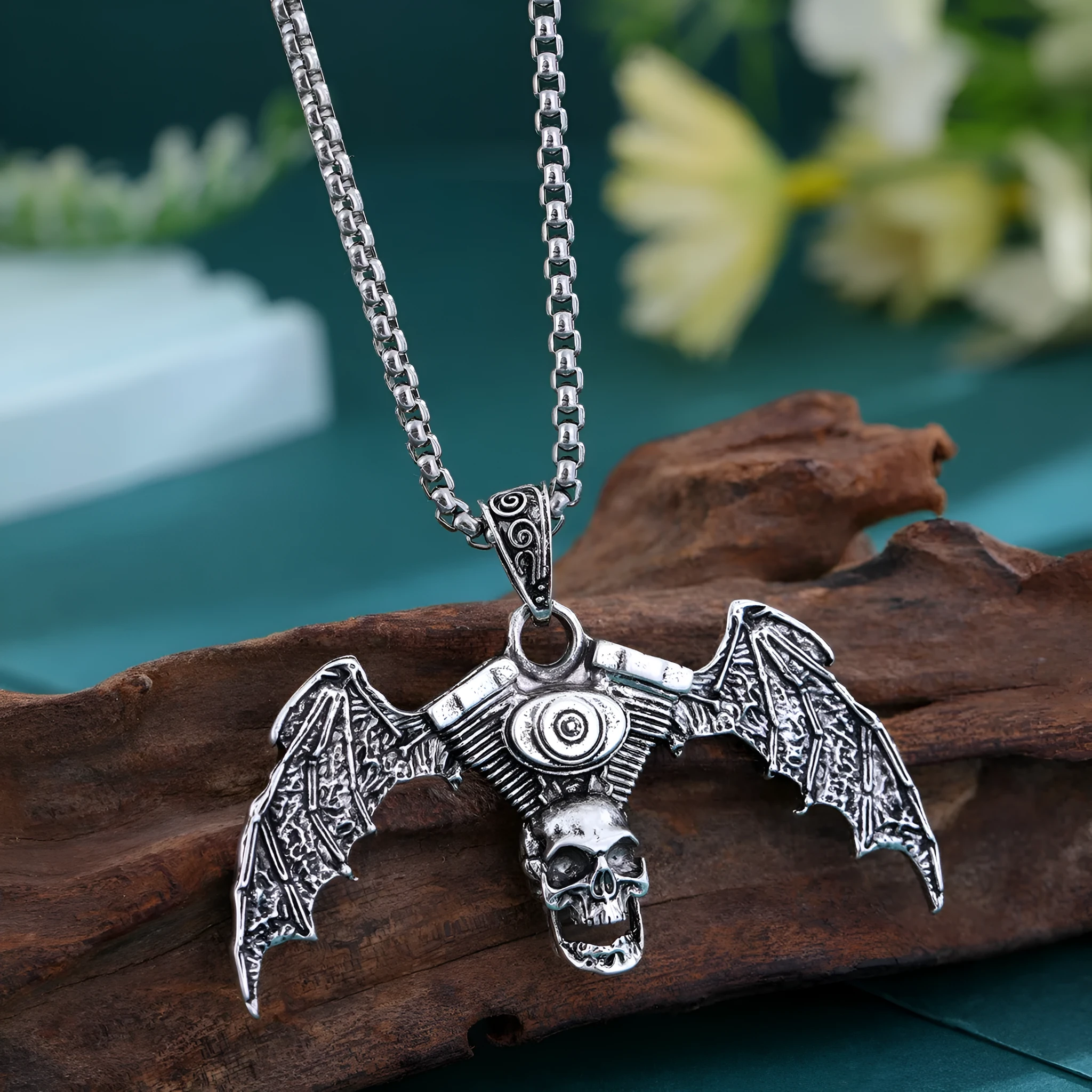 Gothic dark skull necklace with aluminium alloy skeleton wing pendant on dark background