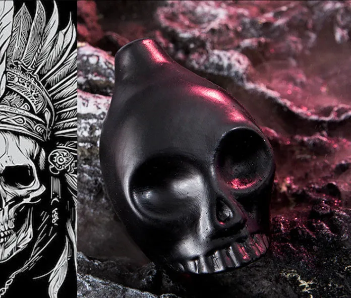 Skull whistle decompression toy made from dolomite ceramic in matte black finish