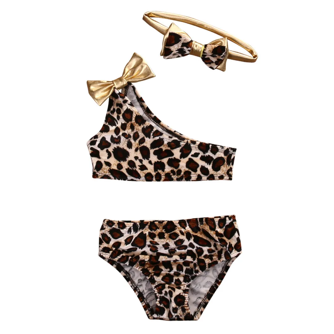 Kids baby girls leopard print one shoulder swimsuit in cotton blend, size 100, isolated on white background