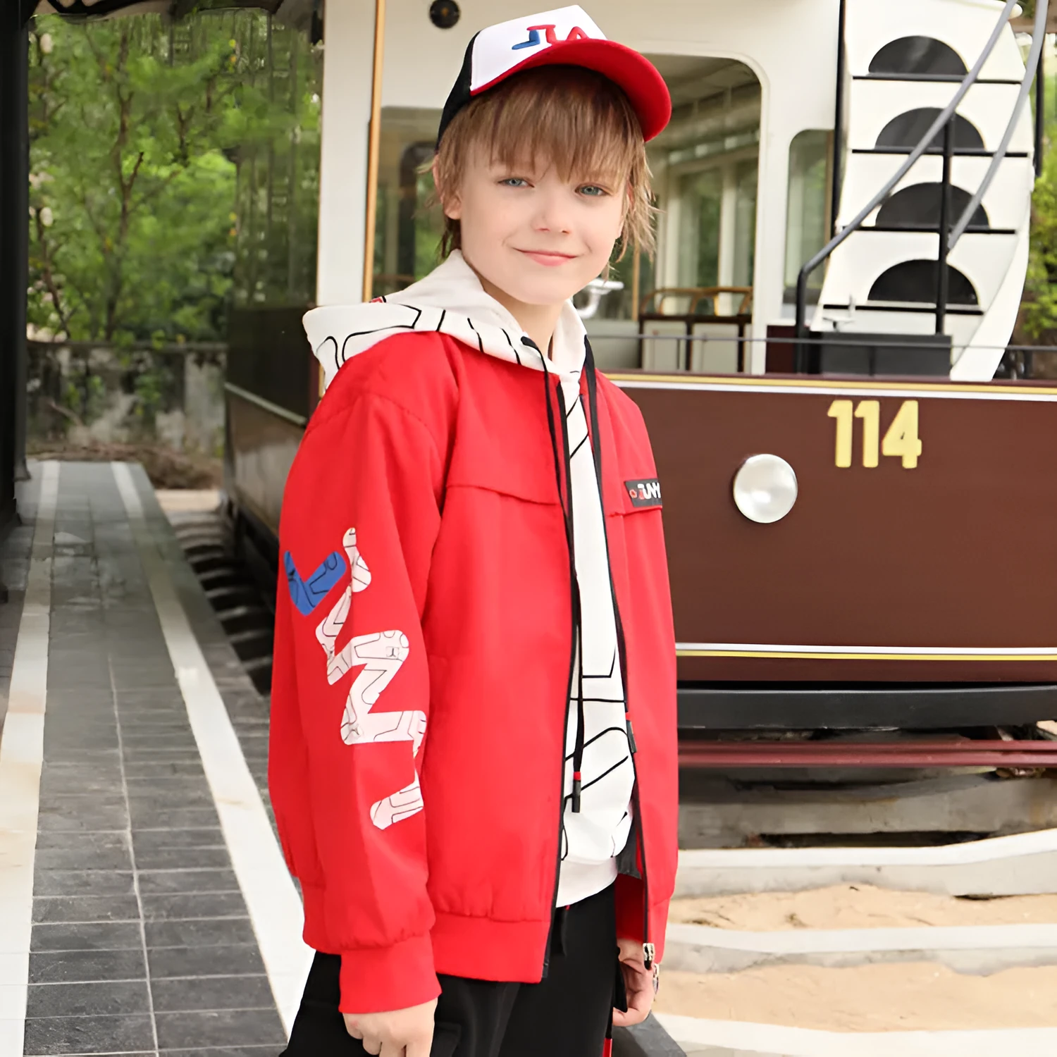 JLNY children's sports jacket in Black with standing collar and letter design on a white background