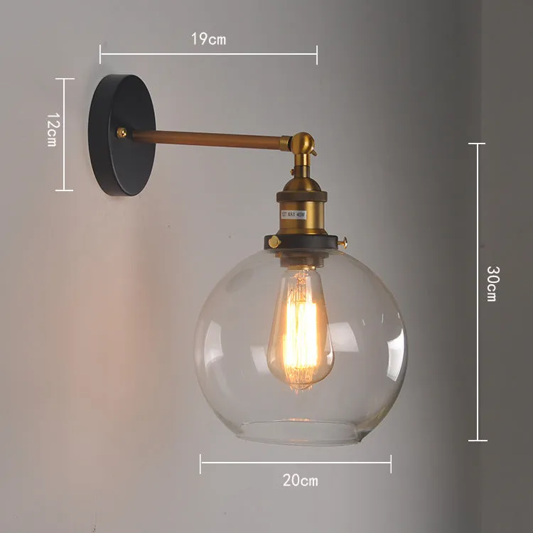 Round retro glass ball wall lamp in amber colour, 20cm diameter, with aluminium holder.