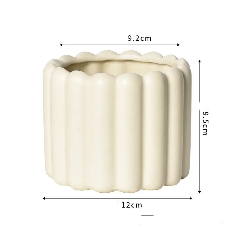 Roman column matte yellow ceramic flower pot with breathable, self-absorbent design for indoor plants