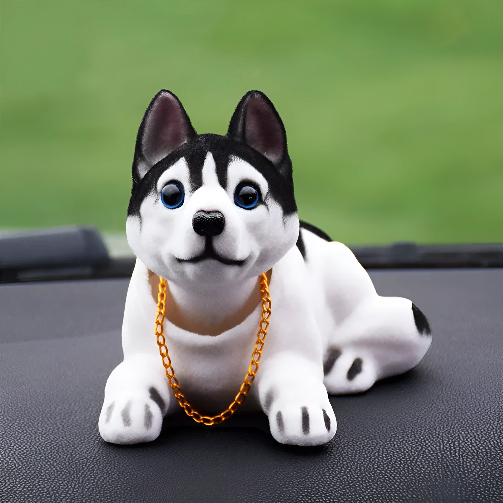 Synthetic resin shake head dog doll in husky design with white auspicious fruit accent on car dashboard