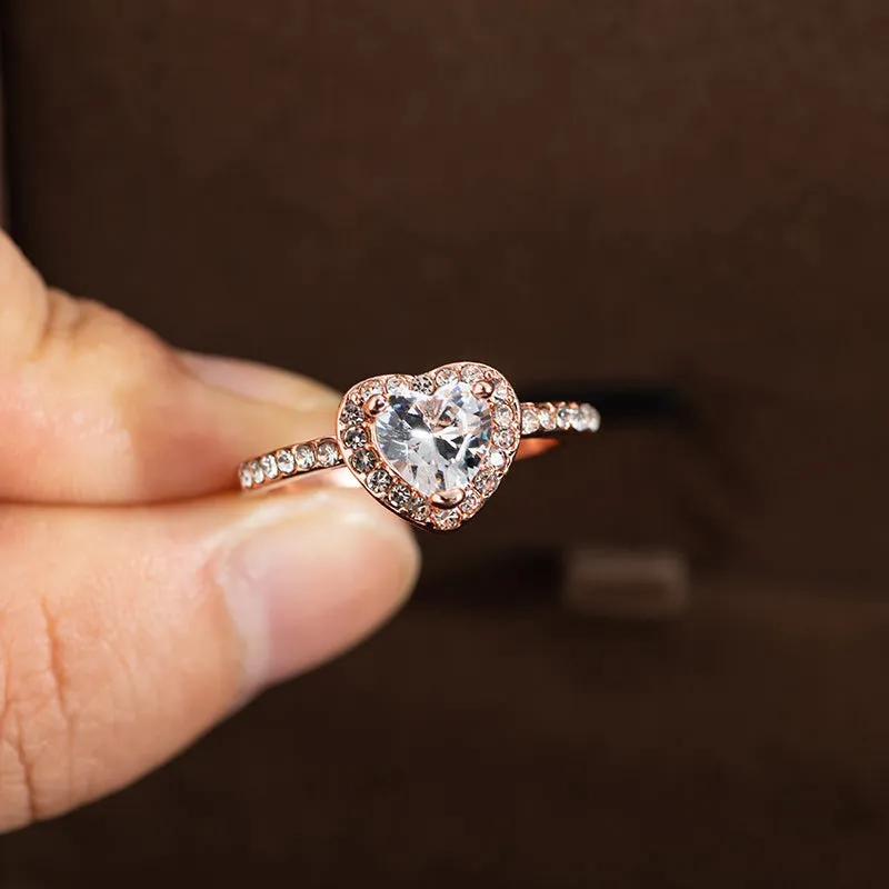Heart-shaped crystal wedding ring with white copper construction in rose gold or silvery finish