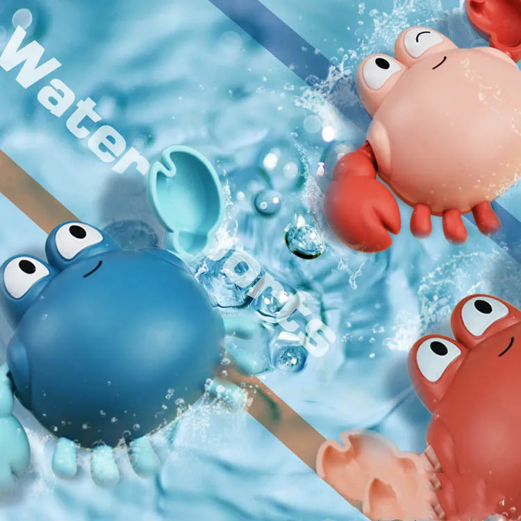 Clockwork crab and turtle bath toys floating on water – pink and blue options