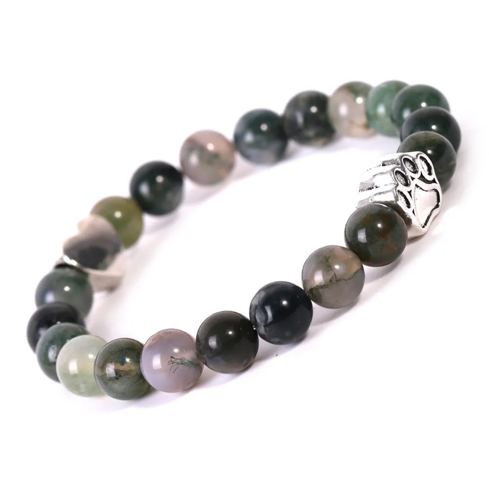 Tigereye and Indian agate stone beaded bracelet with a silver dog's paw charm and a geometric peach heart charm on a white background.