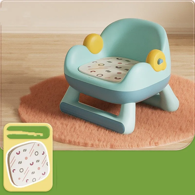 Blue plastic children's dining chair with backrest and PVC soft cushion on a white background
