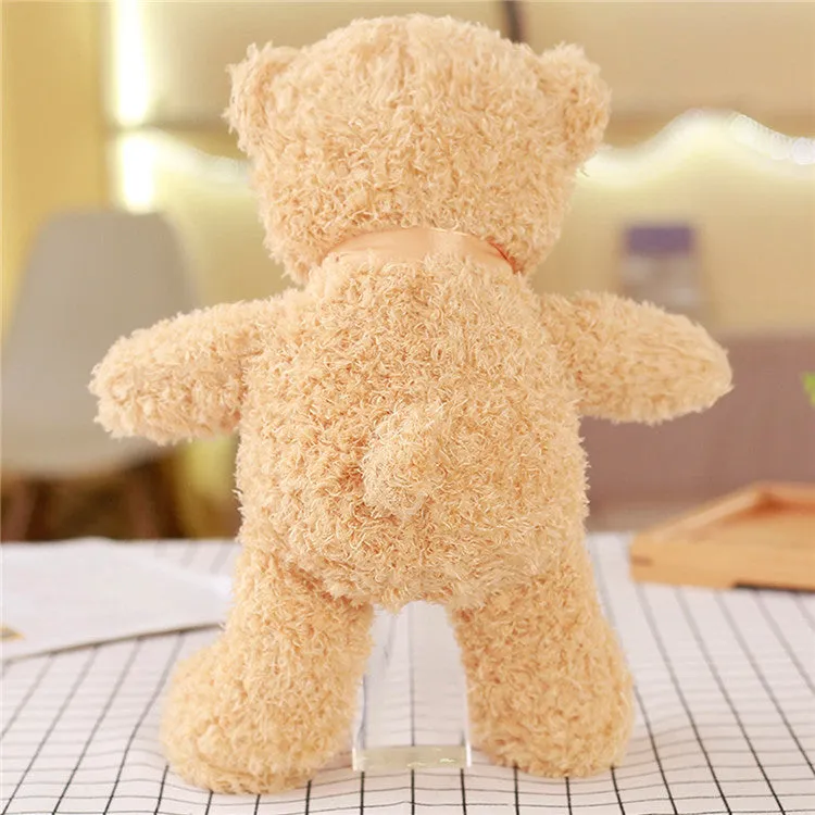 Yellow plush bear toy 30cm tall, made of soft fabric with PP cotton filling, standing upright on a plain background
