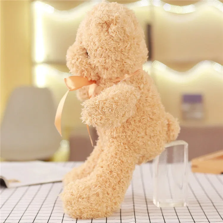 Yellow plush bear toy 30cm tall, made of soft fabric with PP cotton filling, standing upright on a plain background