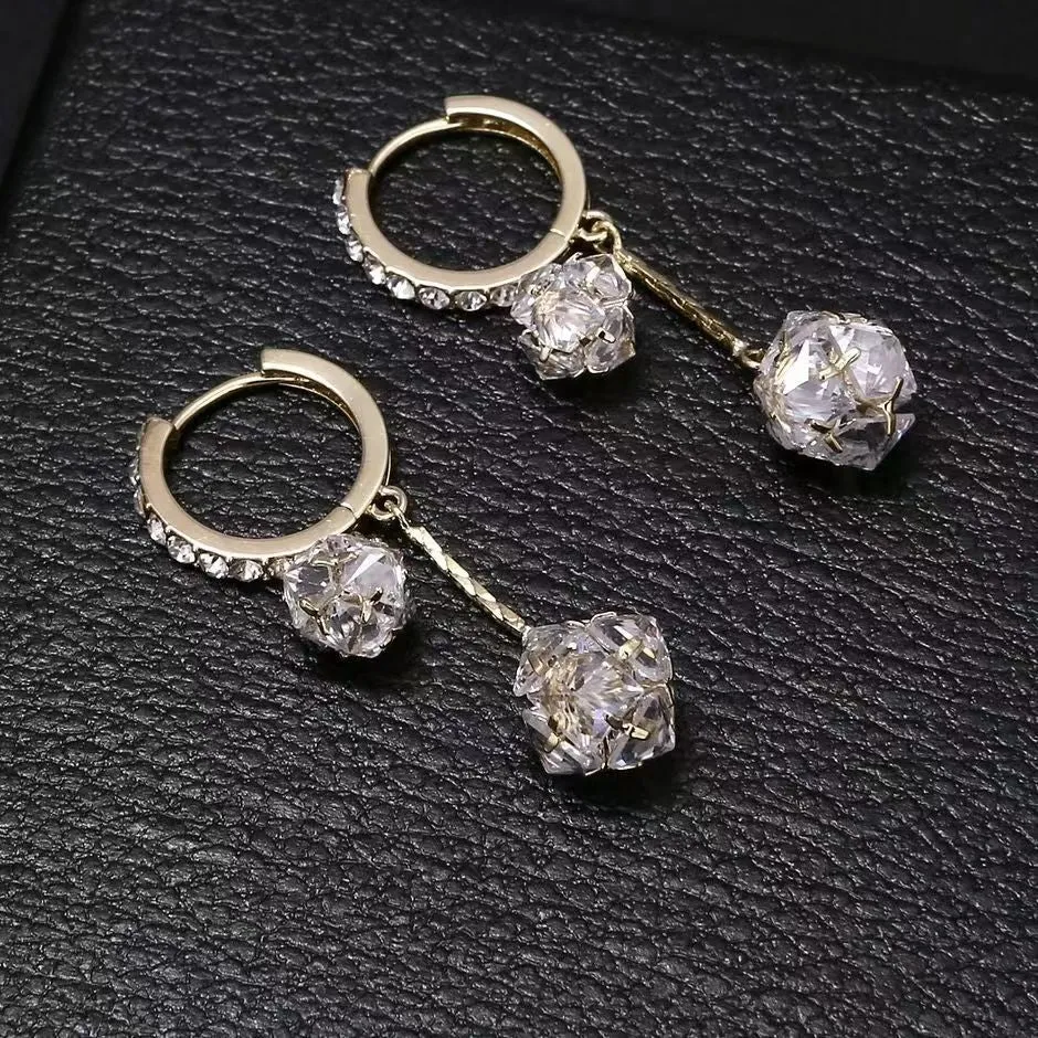 Silver tassel ball earrings with rhinestone drops and confession balloon motifs on copper base