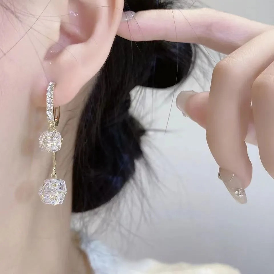 Silver tassel ball earrings with rhinestone drops and confession balloon motifs on copper base