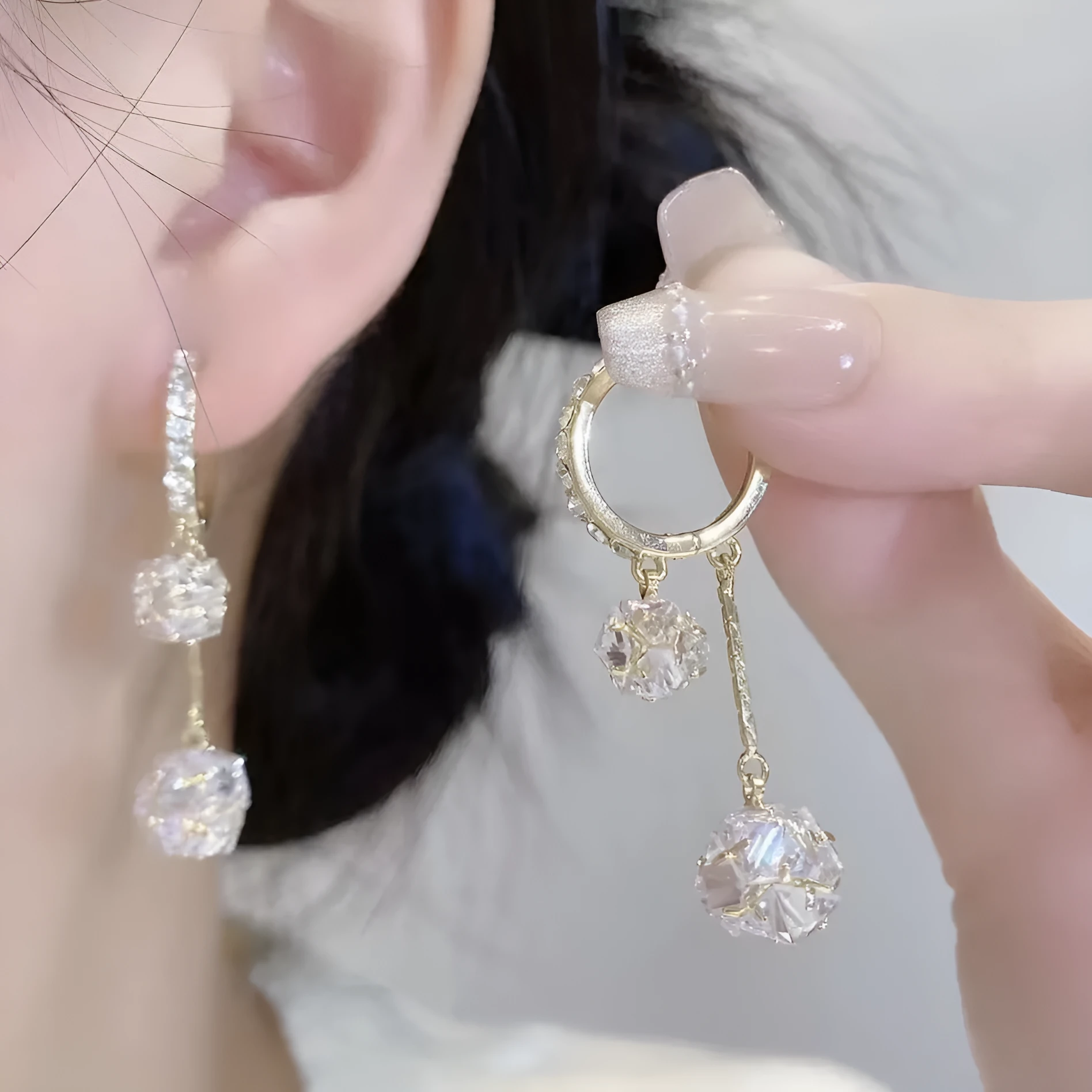 Silver tassel ball earrings with rhinestone drops and confession balloon motifs on copper base