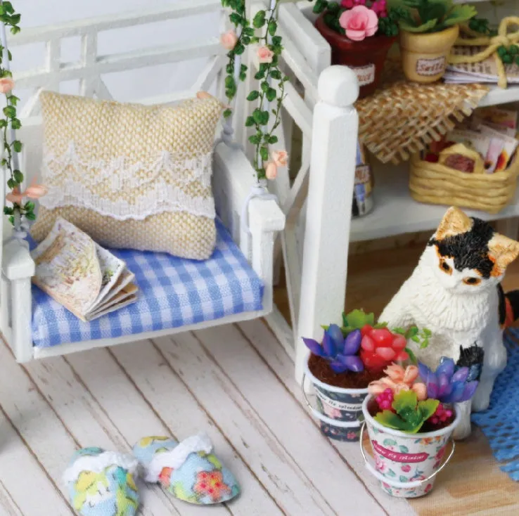 Miniature doll house DIY craft kit with style A on display showing assembled wooden and fabric details