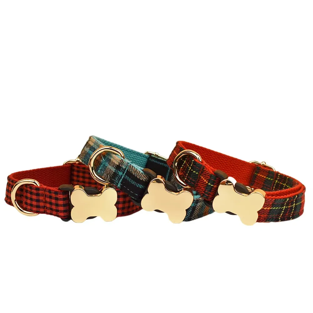 Flat nylon dog collar with a printed grid pattern and a white bone-shaped plastic buckle.